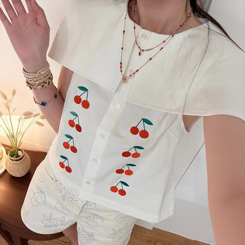 French-Style Niche 2026 Summer New Fresh Navy Large Lapel Symmetrical Cherry Embroidery Sleeveless Women's Shirt French-Style Niche 2026 Summer New Fresh Navy Large Lapel Symmetrical Cherry Embroidery Sleeveless Women's Shirt
