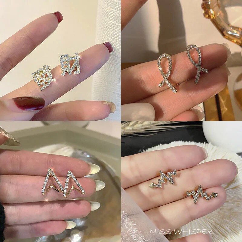 Asymmetric ear stitches high-end niche design earrings female personality earrings rich text 2021 new trend