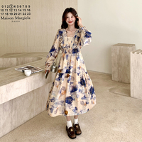 Retro oil painting printed fashionable French dress for women 2025 new autumn style super good-looking fungus edge slimming long skirt