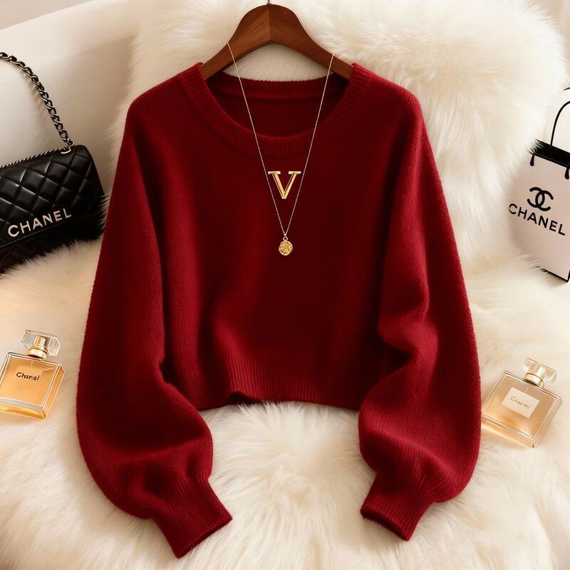 This Year's Trendy Style: a Popular, Relaxed, and Fashionable Red Round-Neck Knit Sweater for Women with a Unique Design