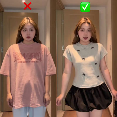A gray T-shirt with a bow shoulder, suitable for women in summer. It's a large-sized, chubby girl with a huge tummy to make her look slimmer and a cinched waist. It's a short-sleeved T-shirt and top