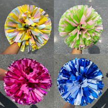 Sports games hand-held objects school cheerleading dance bouquets students cheering props performing colorful balls holding bouquets