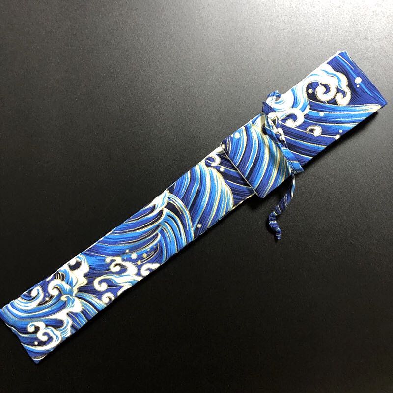 The Cuff is 7 inches 8 inches with a fan bag cotton linen Buffy floral emblared blue protective bag fan set