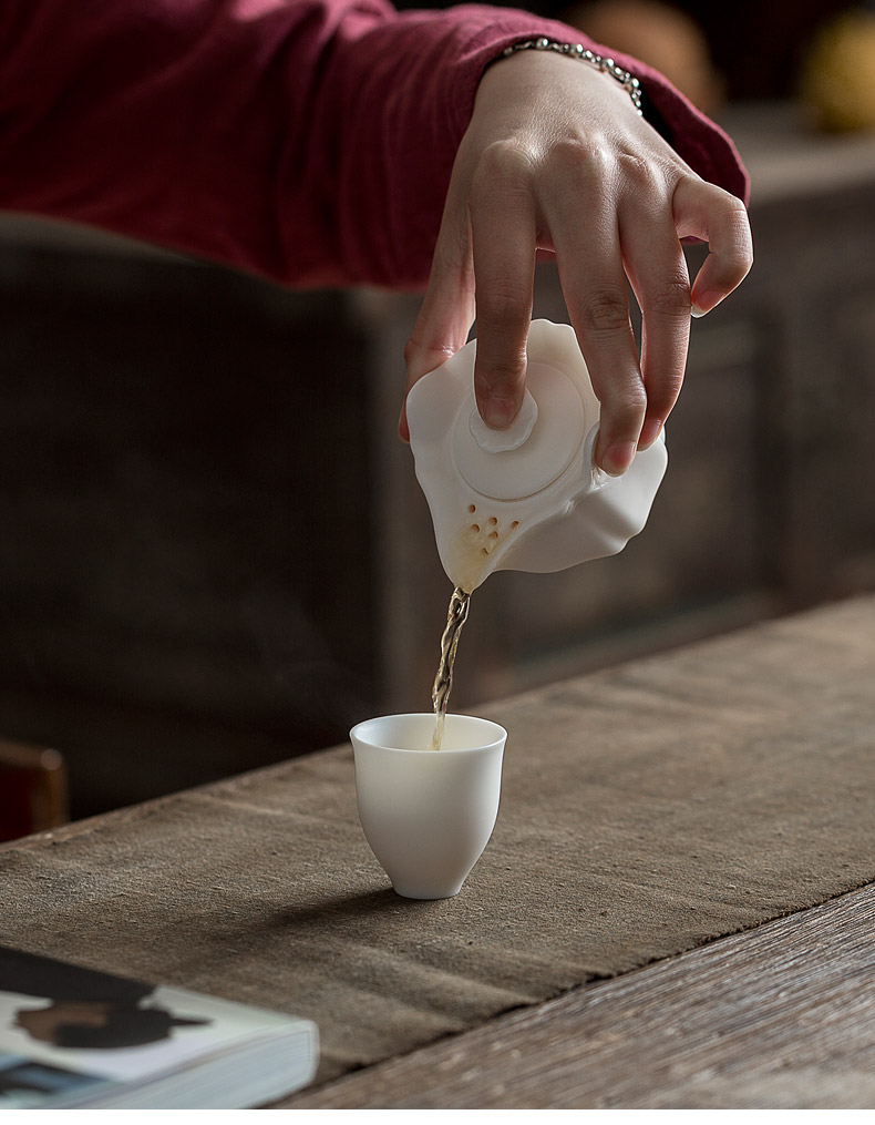 Jun ware dehua white porcelain crack cup set a pot of a Japanese mini hand grasp single portable travel pot of tea