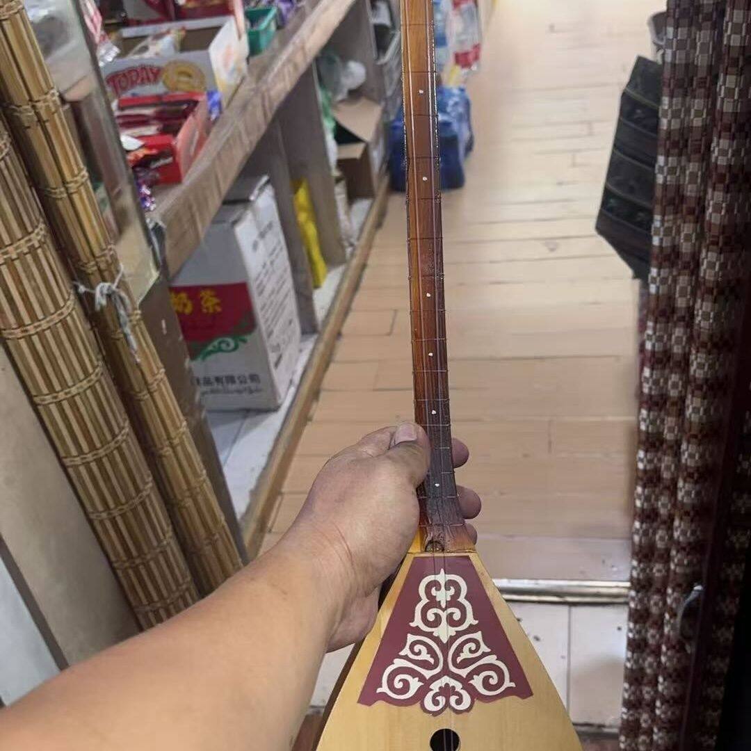 冬不拉：哈萨克族指尖上的草原之歌-冬不拉-淘宝百科网