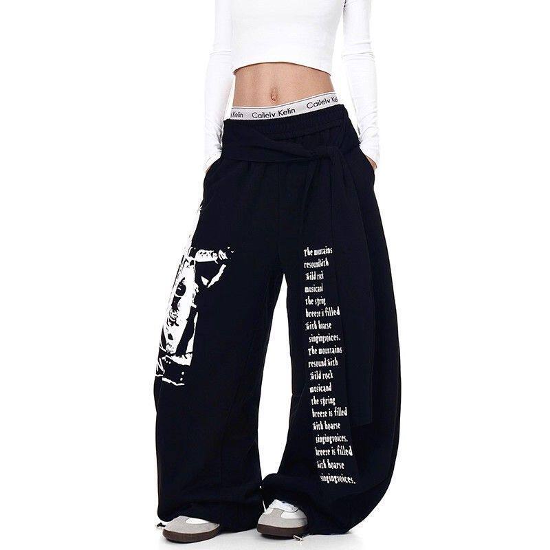 American retro trendy sweatpants with retro letter print, lace-up design, curved blade style, loose-fitting wide-leg street dance pants