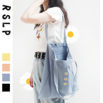 Ruo Su Liang original homemade ins small daisy embroidery shoulder canvas bag macaron ice cream color Japanese