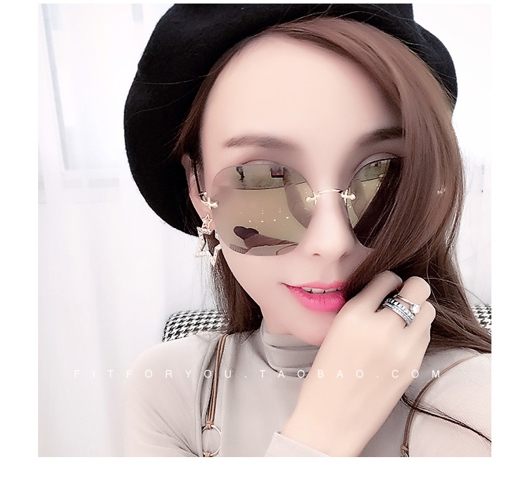 Thời trang không viền cắt kính râm nữ lưới đỏ mặt tròn dài Hàn Quốc phiên bản kính râm cá tính thủy triều Su Yan kính trang trí lớn kính mắt mèo