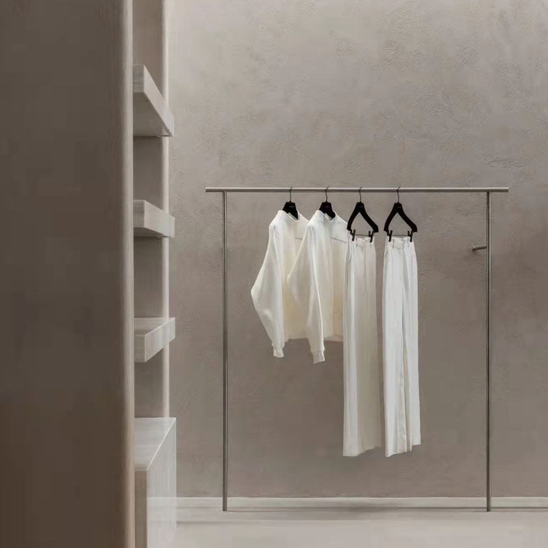 Clothing Store Display Rack Customized Stainless Steel Upper Wall Hanger Wall-mounted Clothes and women's clothes store by wall Display shelves