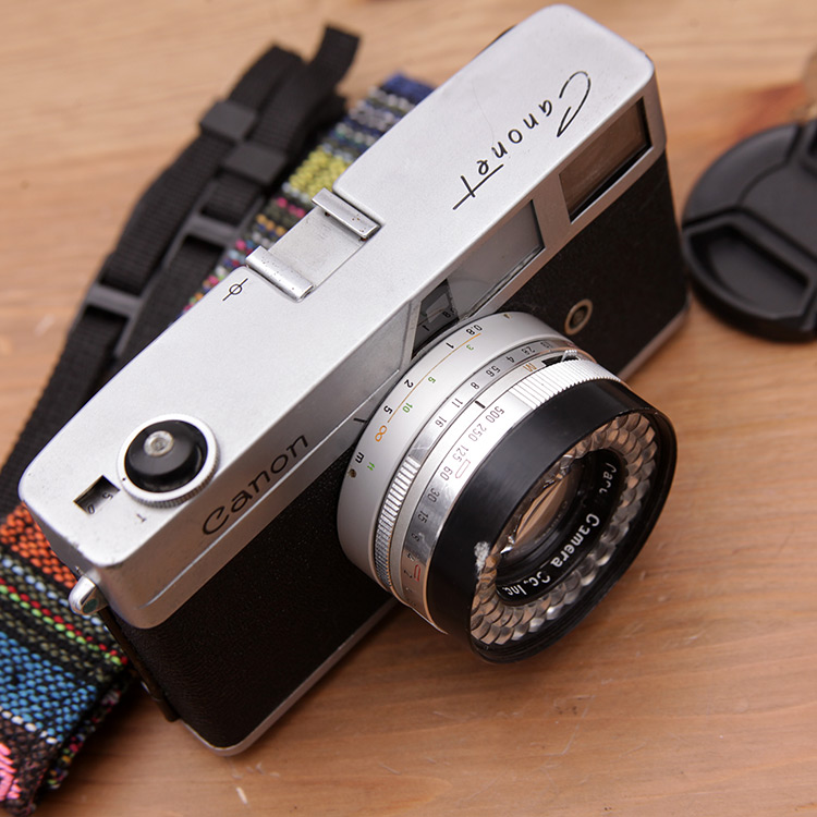 129 Canon CANONET kim loại phim máy phim rangefinder camera 45 1.9 ống kính đạo cụ hiển thị