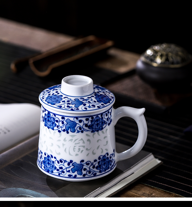 Blue and white and exquisite carving glass ceramic checking with big filter tank capacity of household ceramics and cups with cover