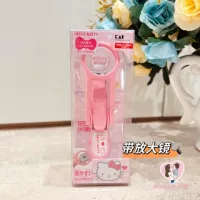 Увеличивая зеркало Тонг-Китти