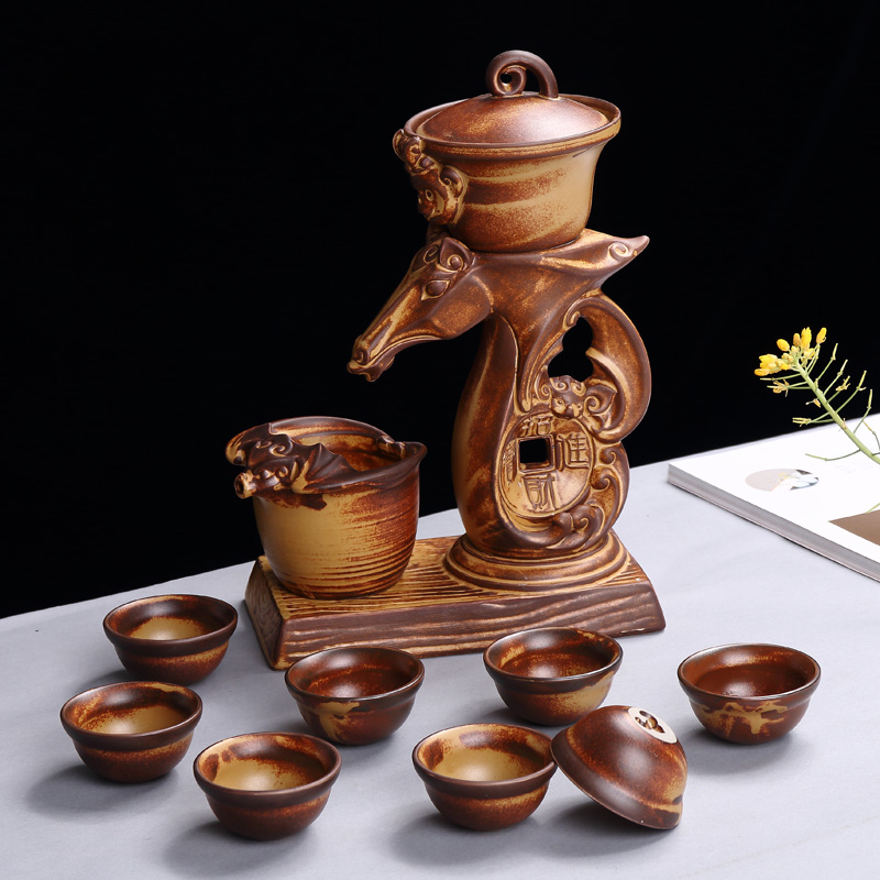 Xin arts margin thick ceramic half of a complete set of automatic tea set suit creative lazy people prevent hot kung fu tea European - style restoring ancient ways