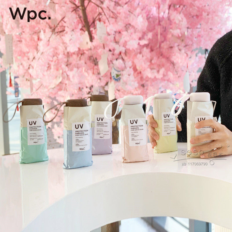 Japan wpc sunscreen umbrella shading umbrella anti-UV clear rain dual-use five-fold umbrella Mini splicing black glue