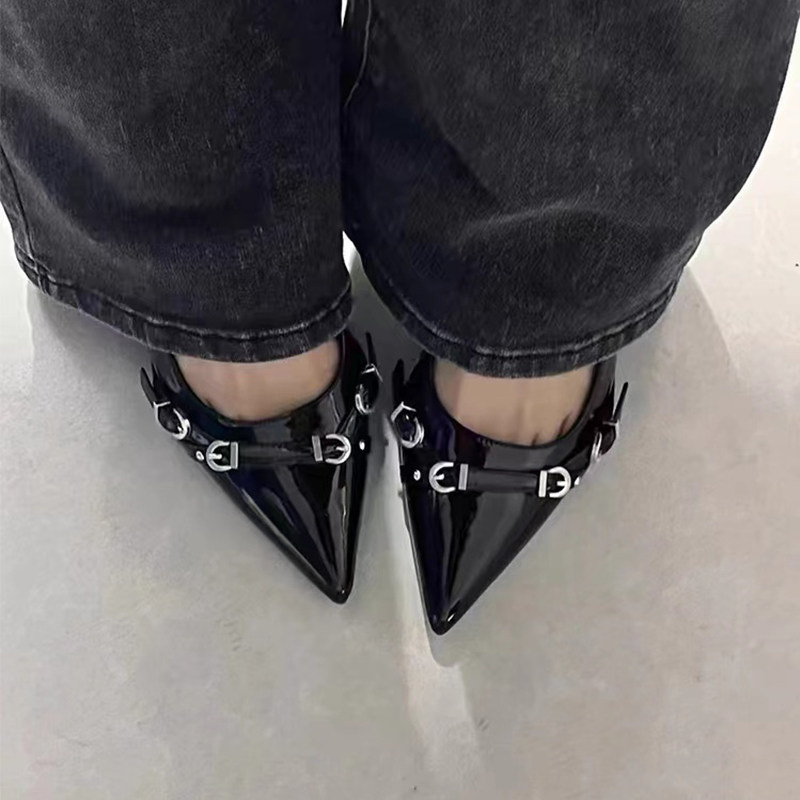 Black high-heeled sandals for women with a unique, sophisticated, and elegant design featuring studs, patent leather kitten heels, and a single strap.