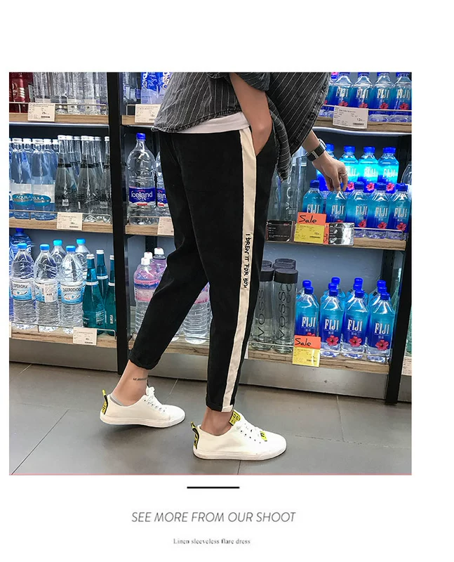 Quần nhung kẻ mùa thu quần nam chín quần thêu cộng phân bón XL quần thể thao chân quần quần thủy triều