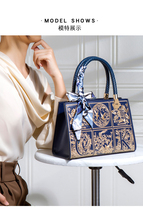 Light and luxurious bag for women 2023 new large capacity embroidered handbag middle-aged lady bag bag single shoulder inclined satchel bag