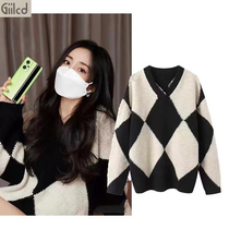 Yang Mi star with the same black and white diamond cashmere sweater 2022 autumn and winter thickened v-neck loose lazy wind sweater women