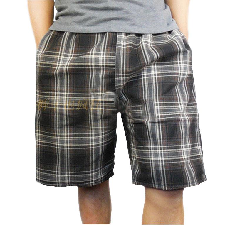 Quần short trung niên nam mùa hè trung niên nam cotton giản dị kẻ sọc năm quần tải quần rộng bãi biển mỏng quần jean đen nam