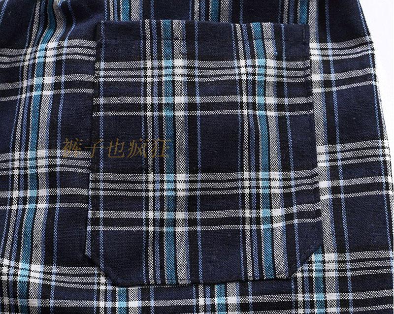 Quần short trung niên nam mùa hè trung niên nam cotton giản dị kẻ sọc năm quần tải quần rộng bãi biển mỏng quần jean đen nam