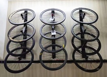 Bicycle hub and rim wall display rack mountain bike rim wheel wall-mounted wall shelf wheel set display rack
