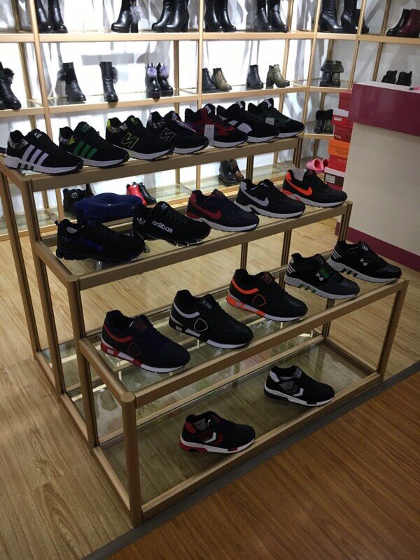 Custom shoe store shoe rack bag shelf Nakajima window steps shopping mall shoe shelf display stand flower shop shelf