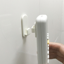  KM paste-on TV air conditioning remote control storage hook wall mini cute storage wall-mounted remote control seat
