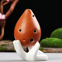 6 -отверстие звучит C надеется на золотисто -коричневый