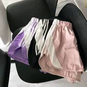 Mùa hè phiên bản Hàn Quốc bên sườn gió màu sắc phù hợp với eo đàn hồi lỏng lẻo thể thao thể thao quần short nóng quần nữ triều
