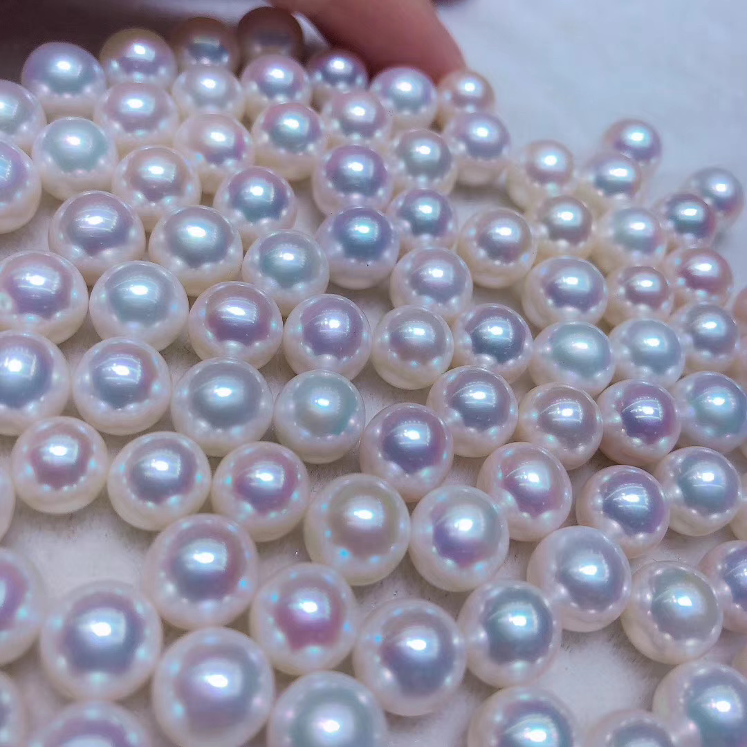 海水澳白珍珠的奢华演绎——欧芙兰18K金三生石耳钉