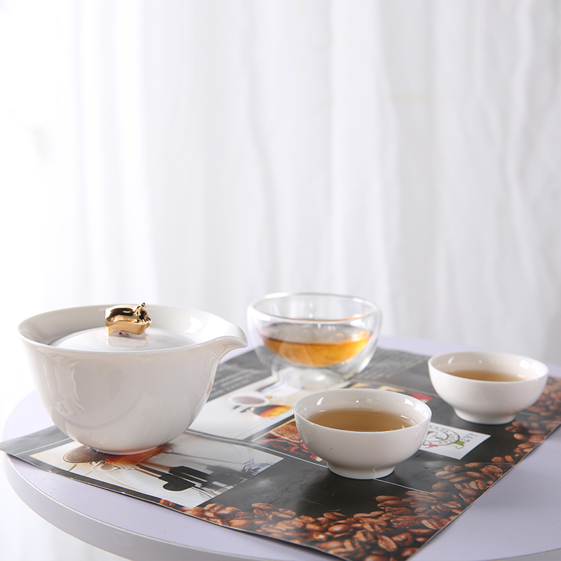 Porcelain heng tong fu pig to crack a pot of travel three glasses of glass tea set suit portable bag type is suing tea gift boxes
