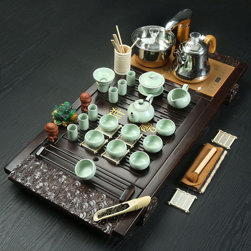 Porcelain heng tong tea cups suit household contracted purple sand pottery and Porcelain of a complete set of kung fu tea set automatic tea tea tray