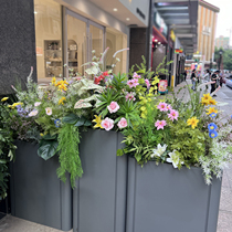 Simulated green plants and flowers exhibition hall handover ceremony area floor-to-ceiling wedding hotel event decoration layout modern floral art