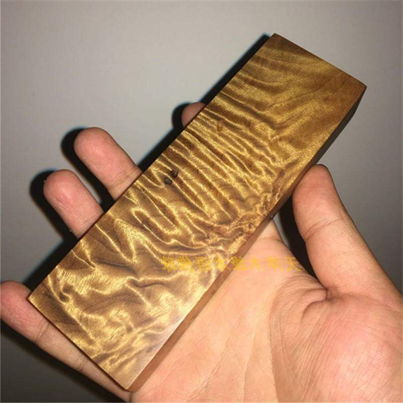 Authentic one thing and one picture golden silk nanmu handle piece authentic Sichuan small leaf Zhennan golden silk nan log water ripple gold
