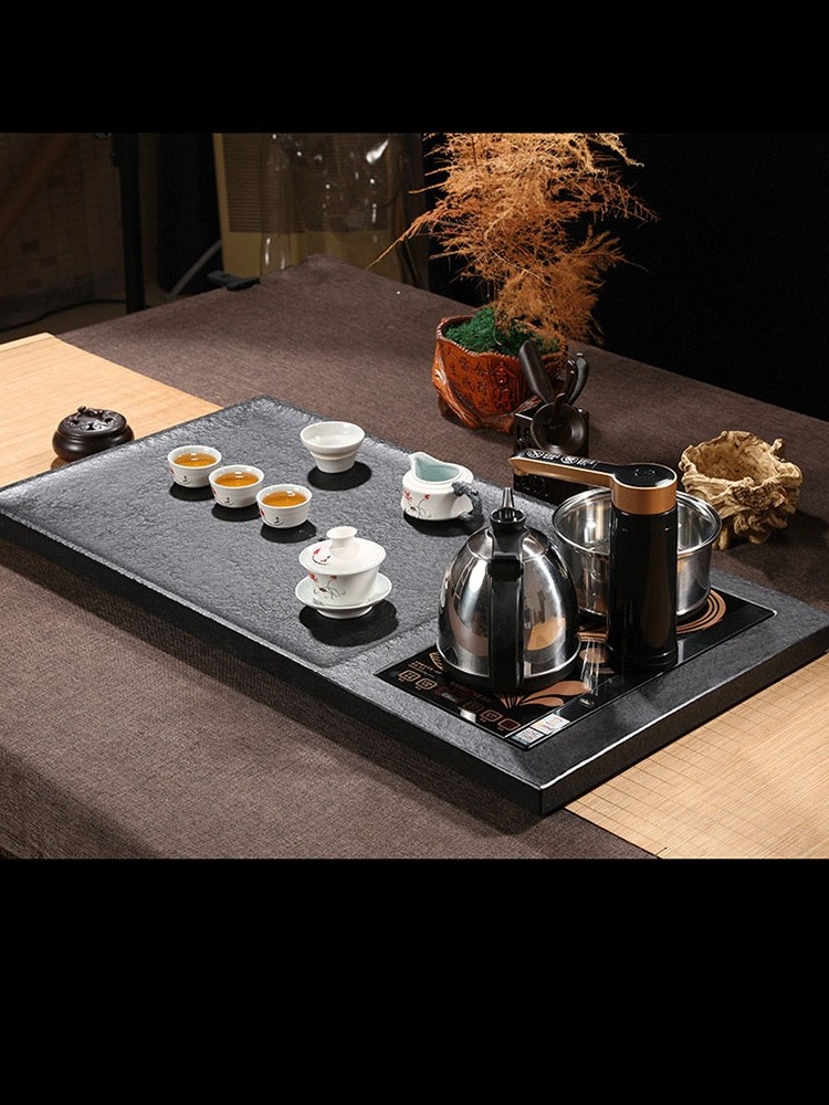 Black gold stone tea plate Whole black gold Stone Kung Fu tea household set Four-in-one automatic induction cooker tea table