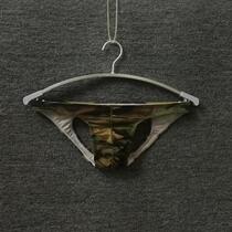 Quick-drying Ice Silk back empty mens triangle hip briefs mens tight sexy small underwear