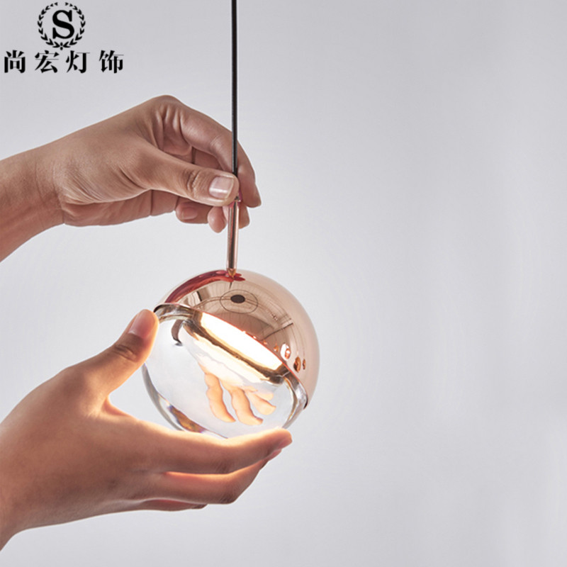 Taiwan Dora chandelier round metal rotating stair lamp modern simple dining table bedroom living room bedside chandelier