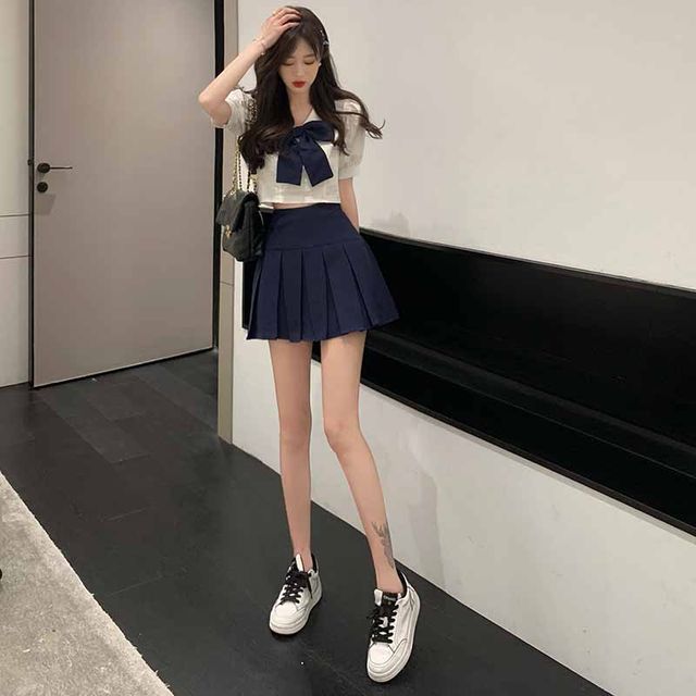 Pure and sweet suit female summer new age-reducing bow top + pleated skirt hot girl jk uniform two-piece