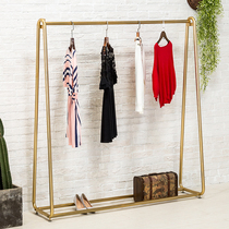 Clothing store display rack Gold clothing rack Womens store shelves Floor-to-ceiling hangers Clothes racks Wrought iron