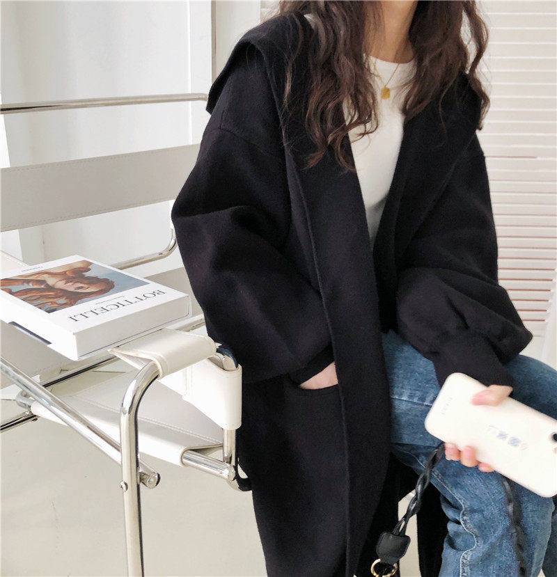 2022 Early spring new even hat sweater cardiovert black Korea Lazy Loose Over Knee Lantern Sleeve Knit Jacket