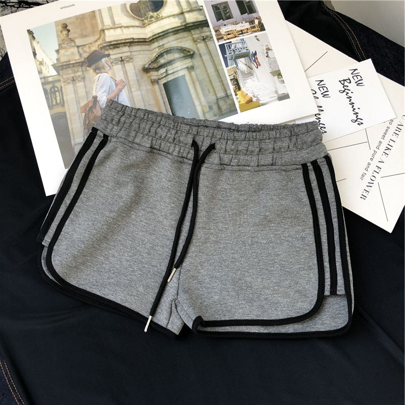 Quần short cotton thể thao nữ hè 2018 phiên bản mới của Hàn Quốc có chất liệu thun thun thông thường, quần lửng ống rộng quần sooc da nữ kết hợp với áo gì