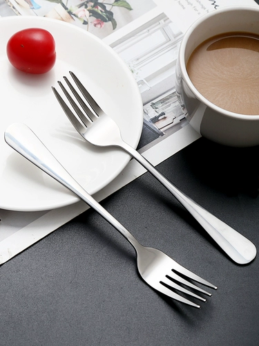 Западная еда тянет на стейк -песок с длинной ручкой