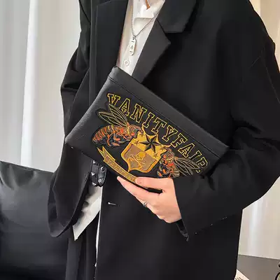 Hong Kong personality embroidery pattern new men's clutch large-capacity leather clutch youth handbag trend