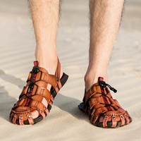 Mùa hè mới cá tính thời trang Baotou dép nam massage đáy nam giản dị đôi dép đôi và dép đế mềm - Sandal giày tăng chiều cao nam