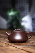 Yixing purple clay teapot pure handmade Jingzhou stone original mine old purple mud medium 270cc fan teacher purple sand pot