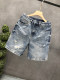 ໂສ້ງຂາສັ້ນ denim ທີ່ມີຄຸນະພາບສູງຂອງຜູ້ຊາຍທີ່ມີທ່າອ່ຽງໃນລະດູຮ້ອນ 2026 ໂສ້ງຂາສັ້ນເຄິ່ງກາງຂອງຜູ້ຊາຍ