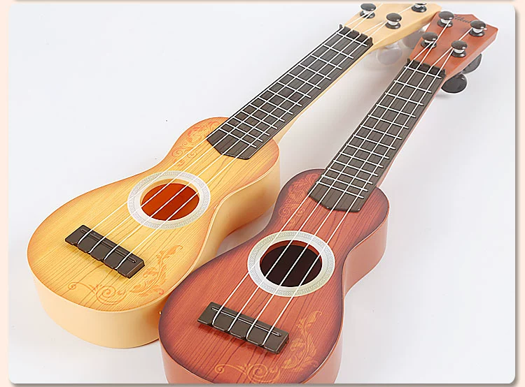 Trẻ em của cây đàn guitar âm nhạc có thể chơi mô phỏng cụ bé giáo dục sớm nhựa Yiwu đồ chơi nhỏ bán buôn gian hàng cung cấp do choi am nhac cho be