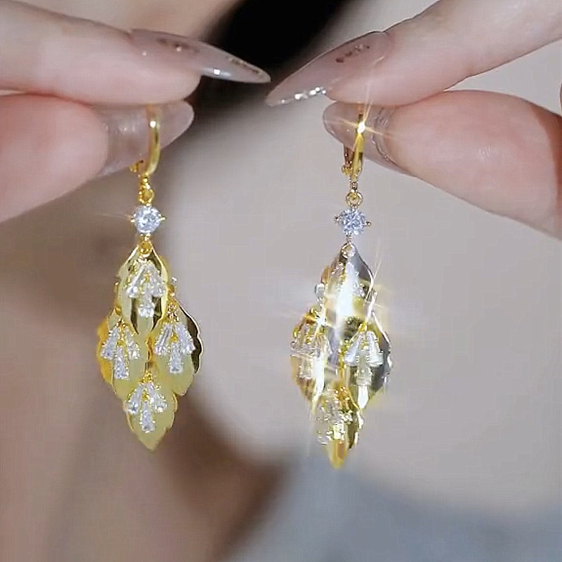 Leaf Tassel Earrings worn on female model