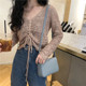 Korean version of loose knitwear short sweater women's long-sleeved mesh hole spring top drawstring hollow V-neck blouse thin section