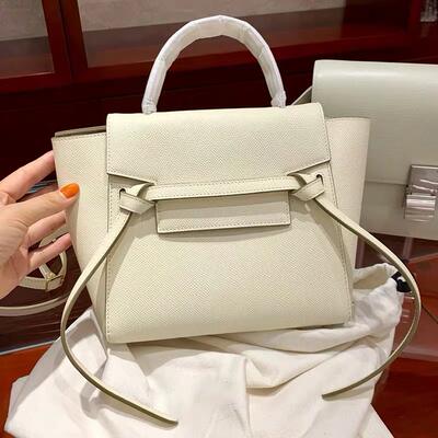 The 2025 new style of Liu Wen's hand-held palm pattern cowhide catfish bag, smiling face bag, hand-held shoulder crossbody genuine leather women's bag